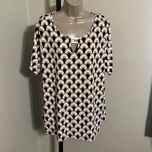 This cute s/s dressy and casual multi top